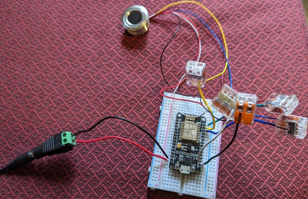 The fingerprint scanner is wired into the NodeMCU